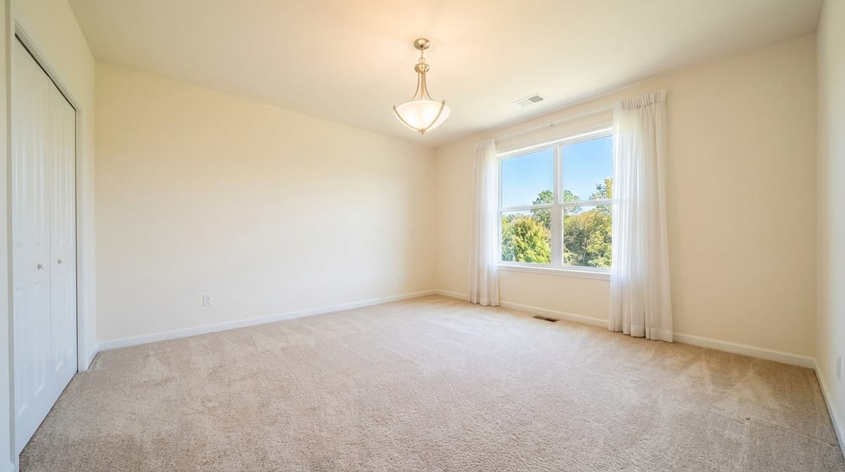 Empty bedroom before modern staging